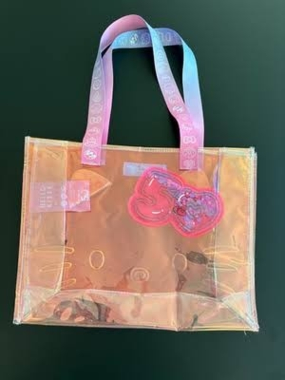 Hello Kitty Iridescent Clear Tote with Pink Heart Charm